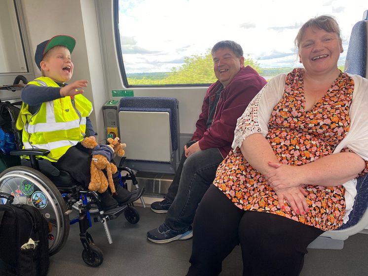 Family affair - Alfie with his dad and mum.jpeg