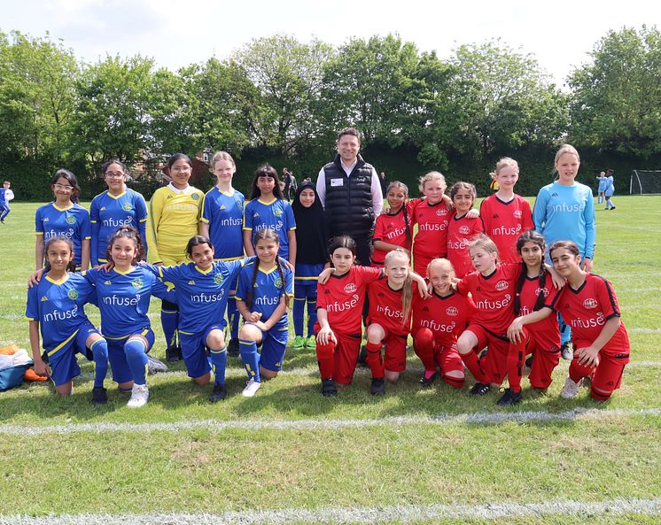 Paul Howard and girls football teams