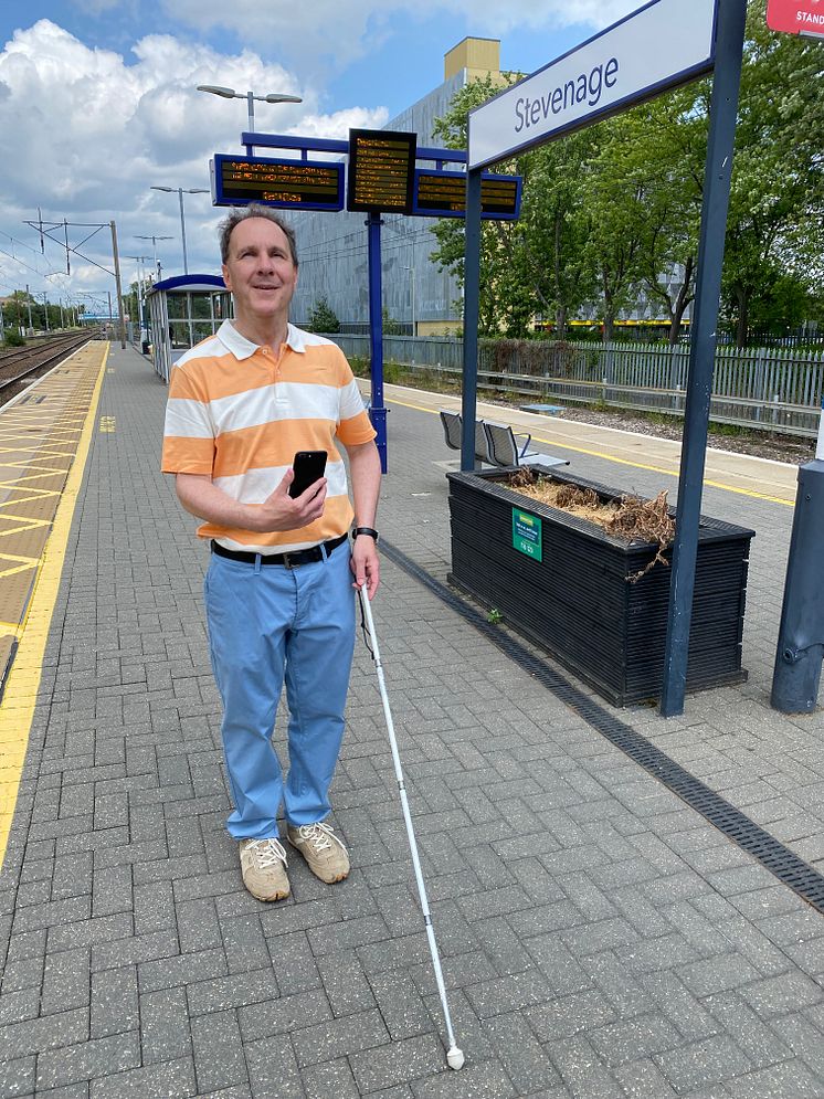 Paul Day, Bedfordshire Sight Loss Council volunteer tests out the Aira app at Stevenage station