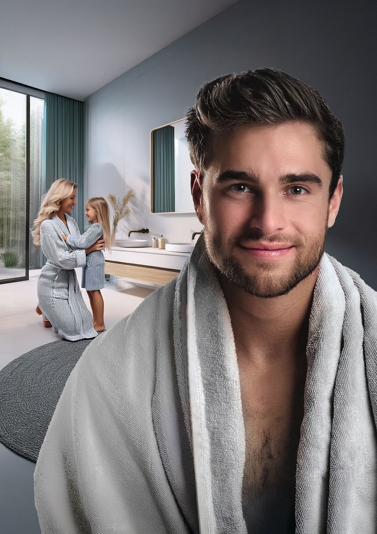 Ein Mann in einem Badezimmer sieht in einen Spiegel. Im Hintergrund ist seine Familie bei der Morgentoilette zu sehen.