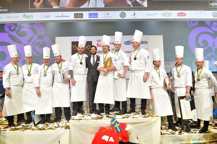 Prispall Bocuse d´Or Europe 2014. Från vänster: Det danska teamet, det svenska teamet, det norska teamet.