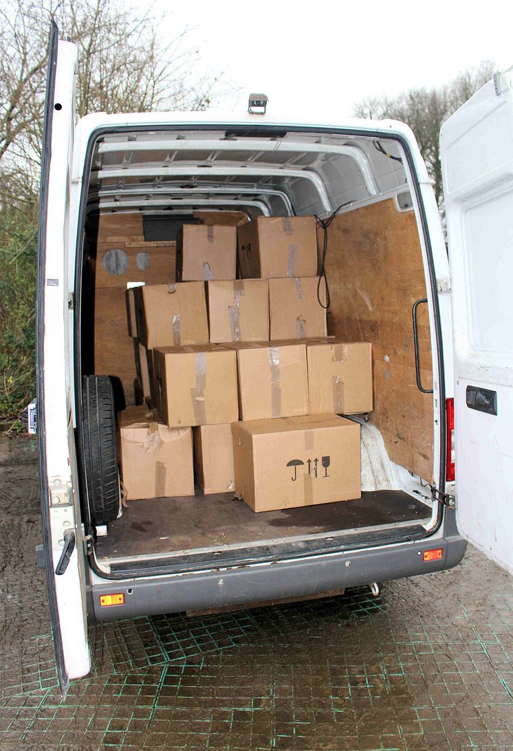 SE 06.17 Boxes containing  cigarettes in back of van