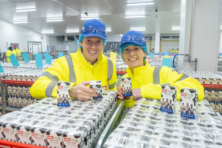 Müller Milk & Ingredients CEO Patrick Müller and Scottish 400 metres hurdles record holder and multiple medallist, Eilidh Doyle at Bellshill Dairy 