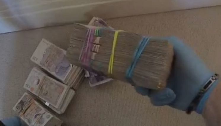 Piles of cash discovered during police searches connected to Wen