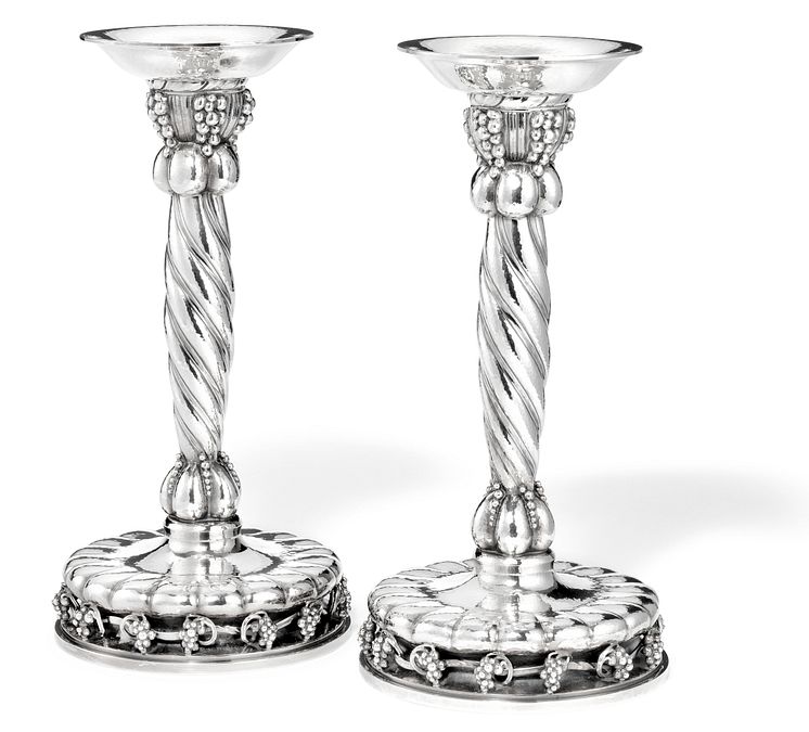 Georg Jensen: A pair of silver candlesticks