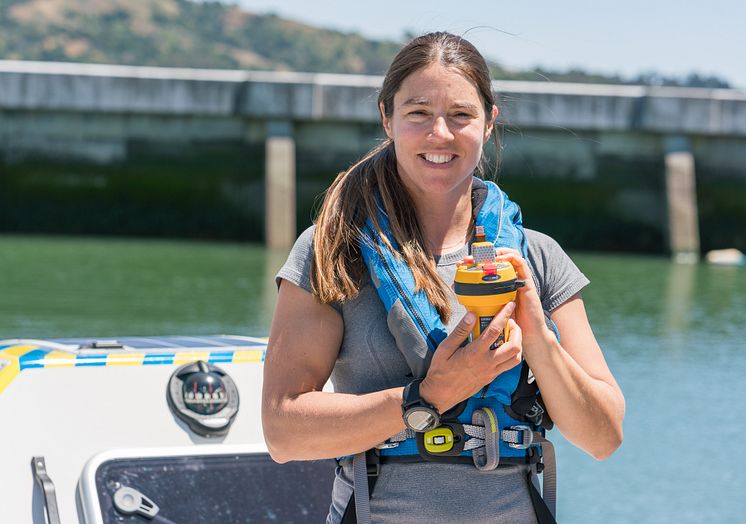 Hi-res image - Ocean Signal - North Pacific solo rower Lia Ditton with her Ocean Signal SafeSea E100G EPIRB