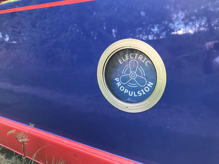 Hi-res image - Fischer Panda UK - Sacred barge owners Dale and Alison Canfield have 'electric propulsion' porthole covers after installing the latest technology supplied by Fischer Panda UK