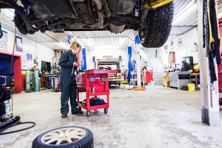 Female mechanic in garage