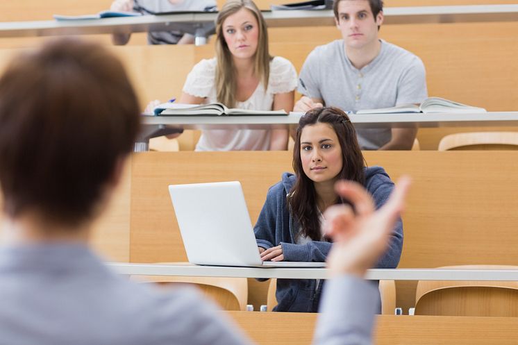 3930263-students-sitting-listening-to-the-teacher.jpg