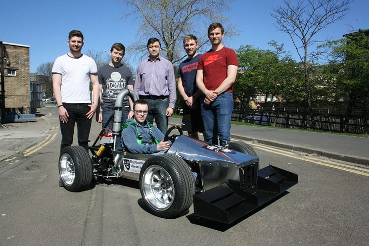 Students from Northumbria’s Mechanical, Automotive and Electrical Engineering programmes, with Dr Ulugbek Azim​ov (centre), Programme Leader in Automotive Engine​ering.