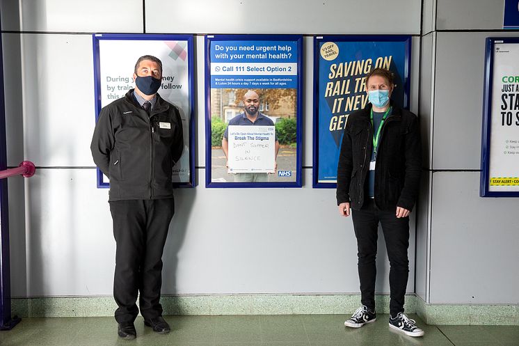 Joe Healy (left) and Ben Salmons with one of the NHS posters