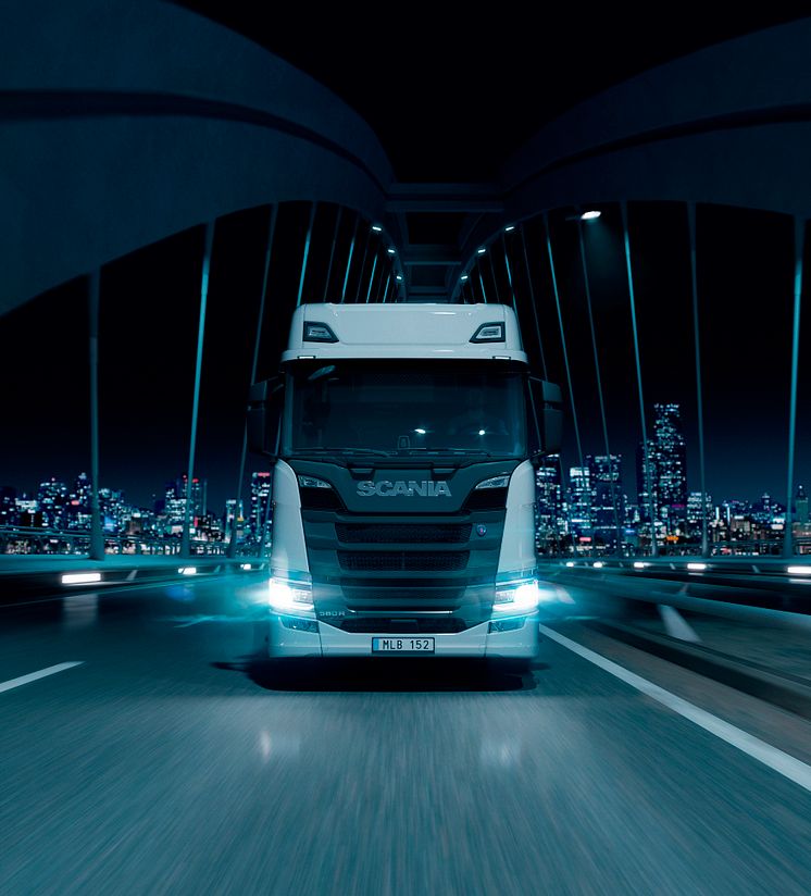 23104-003-Driving-truck-with-city-background