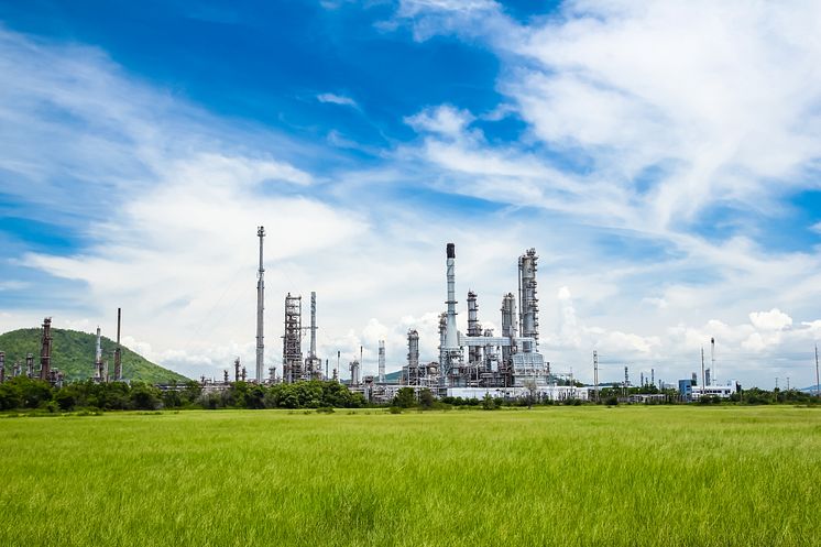 Refinery in the green with blue sky - Tungphoto_Shutterstock_125837234