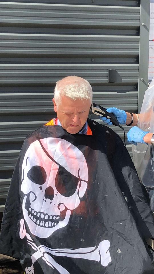 Go North East operations manager Malcolm Davis having his hair shaved off to raise funds for University Hospital of North Durham's children's ward