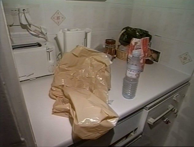 Brown plastic bag in kitchen