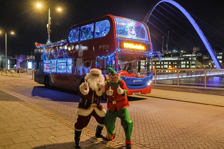 GNE Santa Bus - Santa and elf.JPG