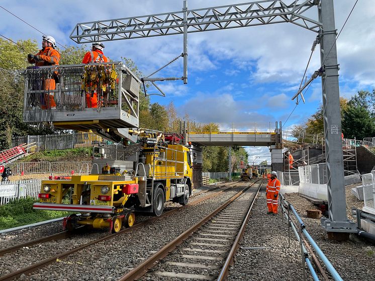 Network Rail engineers carry out wiring work on the Midland Main Line