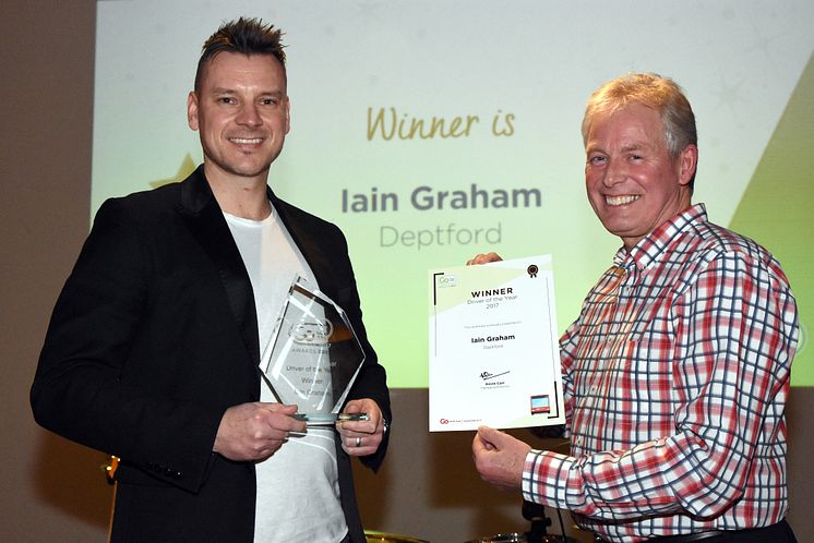 Driver of the Year winner - Paul Coyle collects on behalf of Iain Graham from managing director Kevin Carr