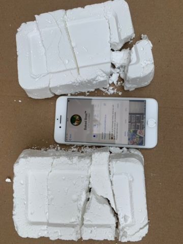 White Blocks of Drugs with Baked Store App in Background (Online drug ring case).jpg