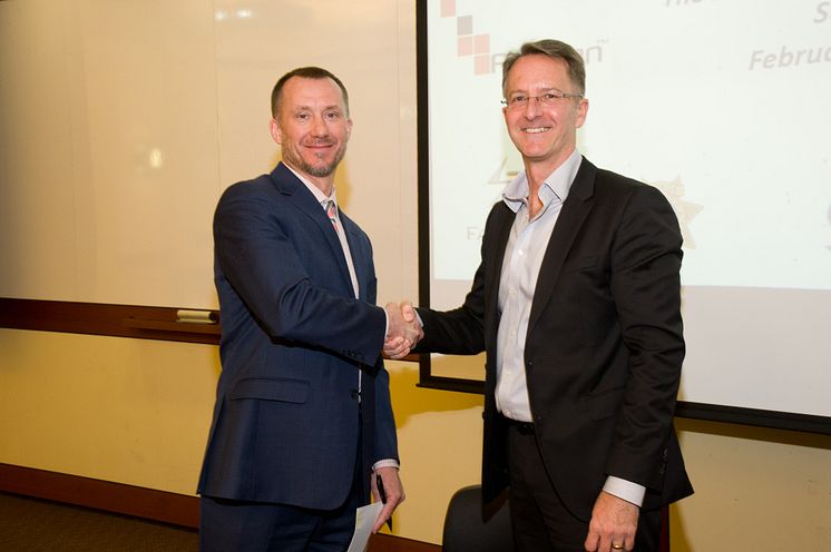 Nevada Gaming Control Board Chairman AG Burnett shakes hands with Esports Integrity Commissioner Ian Smith