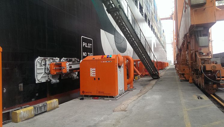 Safe and sound: MoorMaster automated mooring units hold a container vessel in position at Salalah.