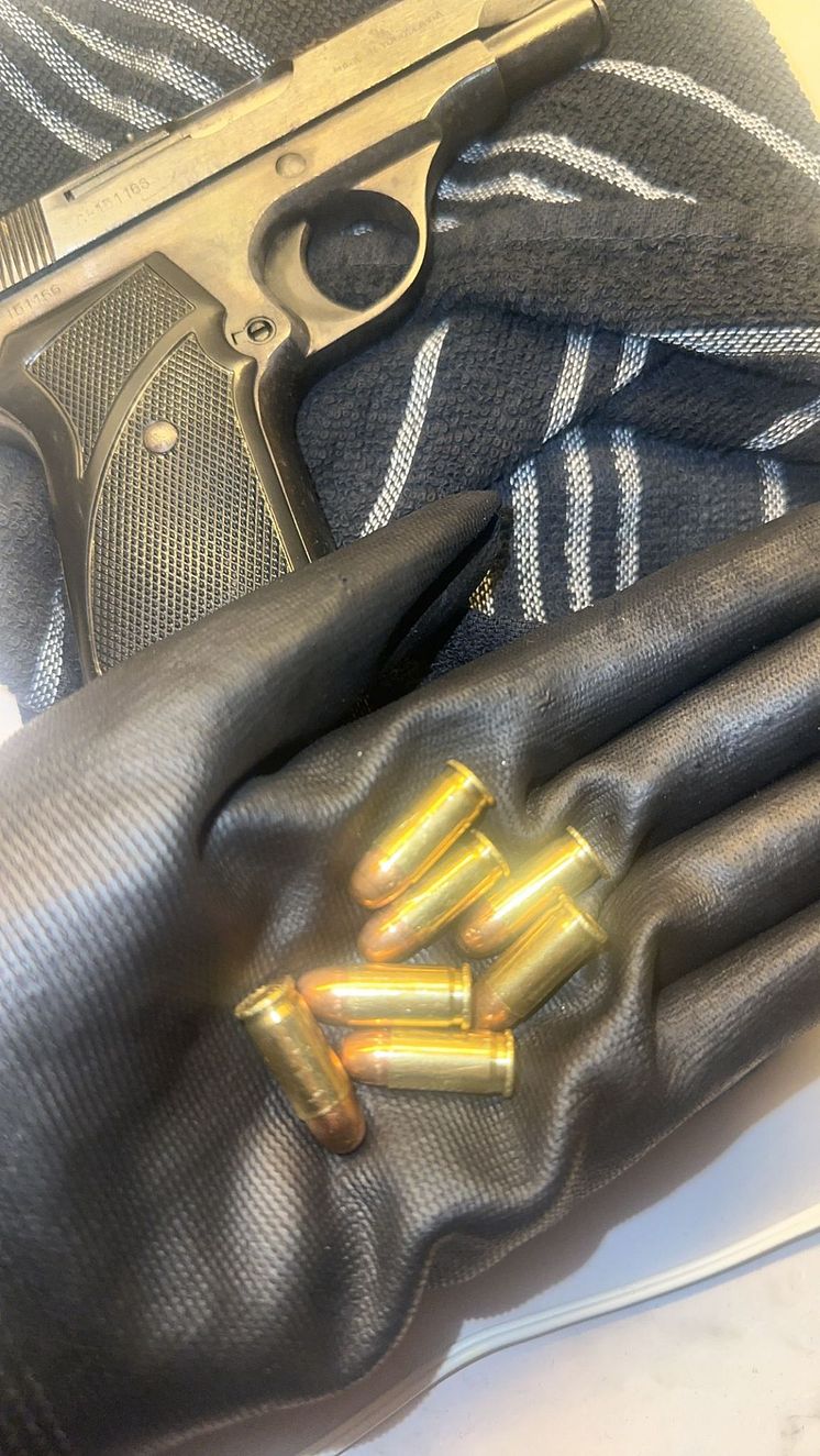 Scott holding bullets.jpg
