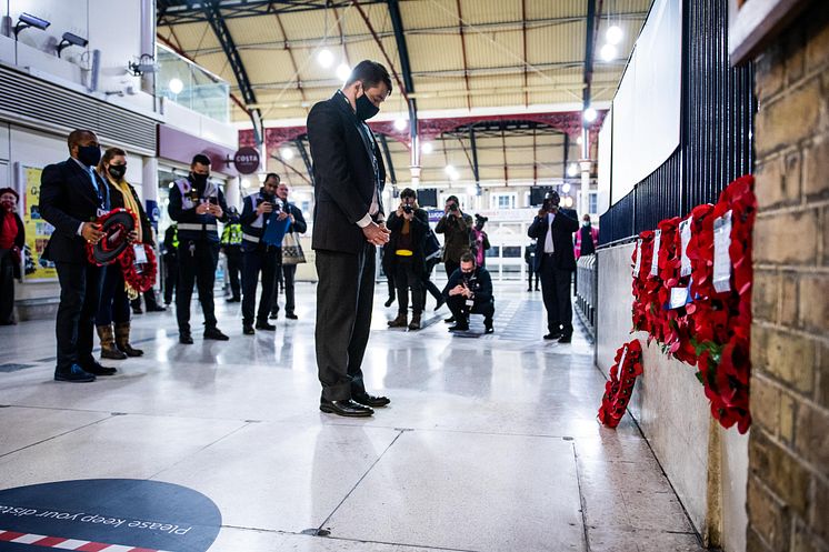 Chris Fowler, Customer Services Director for Southern, marks two minute silence at platform 8