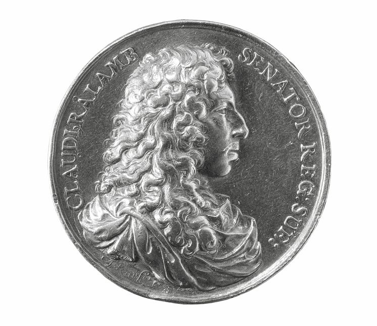 Silver coin portraying founder Claes Rålamb