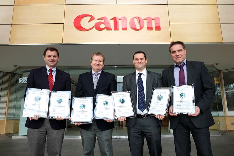 Photos of the Canon team and BLI team with certificates