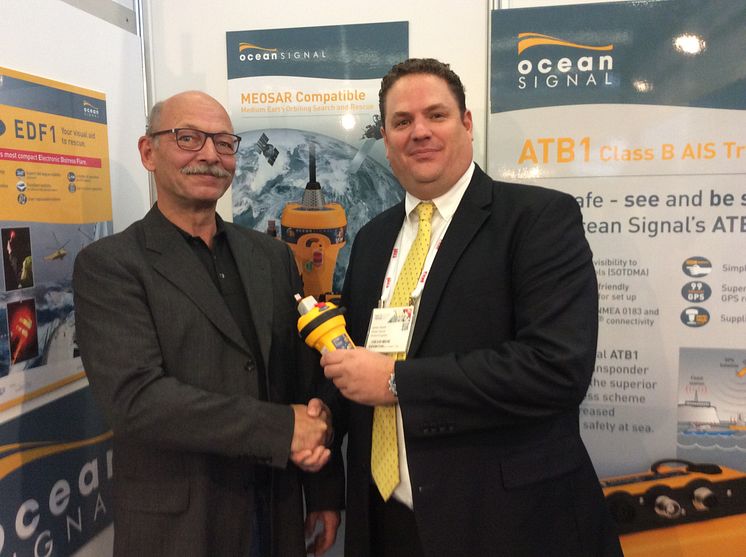Hi-res image - Ocean Signal - Niko Reisch, Managing Director, Nordwest-Funk (left) with James Hewitt, Sales and Marketing Manager, Ocean Signal, at METSTRADE yesterday on the Ocean Signal Stand 03.125