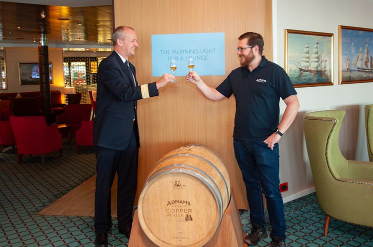 Adnams' Bradley Adnams with Fred. Olsen Cruise Lines Hotel Manager Iain Gibson