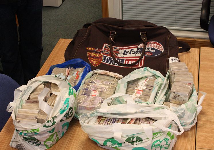 £15m fraud gang jailed - £159,990 of the cash seized
