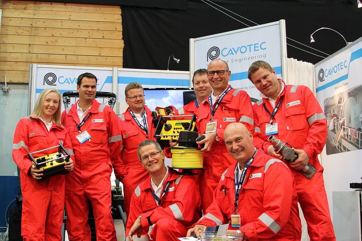 The team (and equipment) at the Cavotec stand - 290/7 in Hall B - at ONS2012