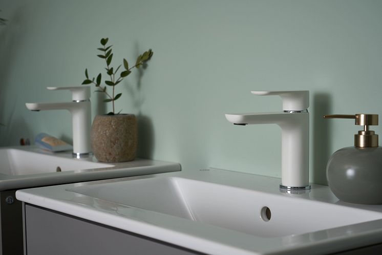 White (matte) Estetic taps on a gray Graphic bathroom cabinets. 