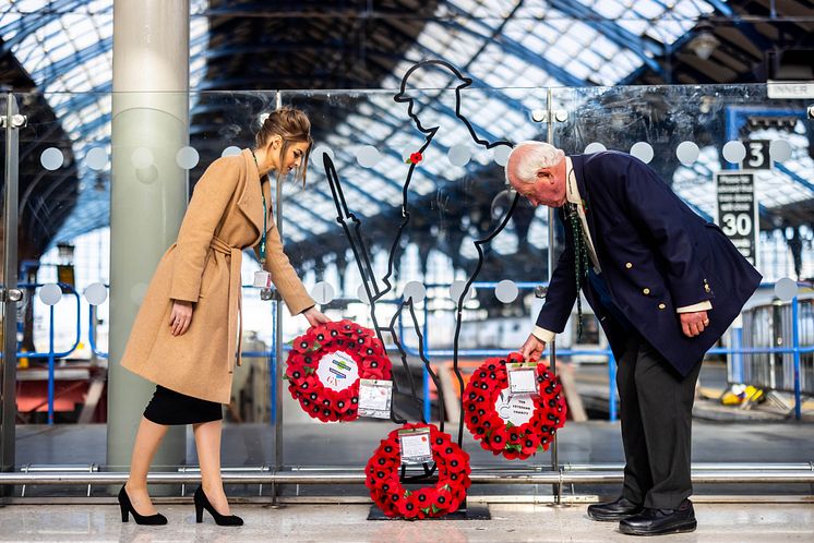 A wreath is laid at Brighton station