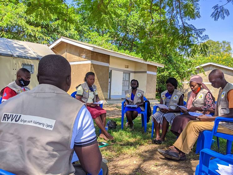 Members of the research team in Nakivale, Uganda, supporting Photovoice activity. Photo by Robert Turyamureeba