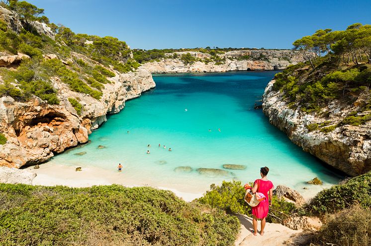 spain-mallorca-woman-watching-beach-911513804-full.jpg