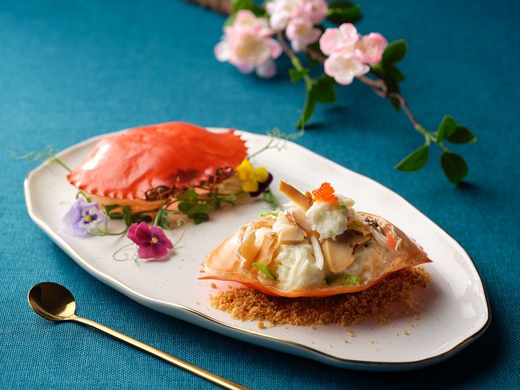 Stir-fried Egg White, Diced Abalone, Milk and Crab Meat served in Crab Shell.jpg