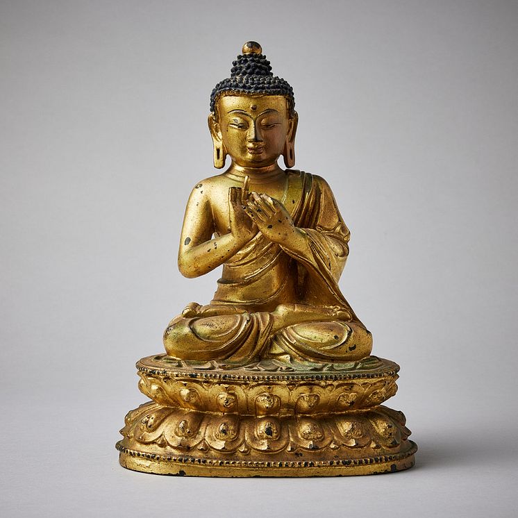 A Cold Gold Paste Bronze Figure of Buddha Dipankara