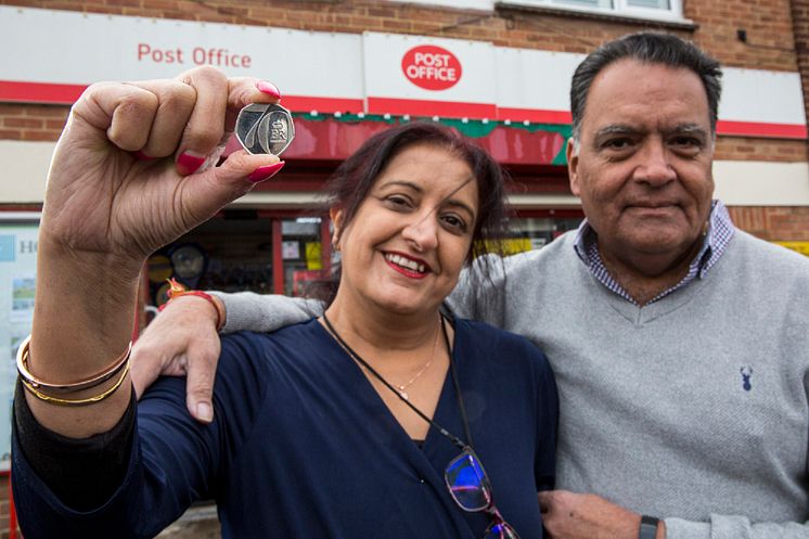 Postmaster Umesh Sanghani and his wife Rashmita outside Dedworth Green Post Office low res.jpg