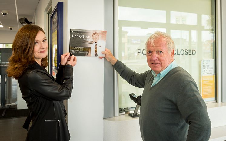 Sharon Dartington and Bob Redman show where the memorial plaque will be placed