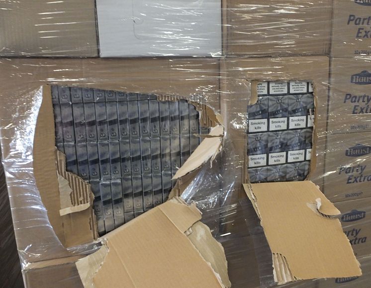 Op Fuzzy - seized cigarettes in warehouse