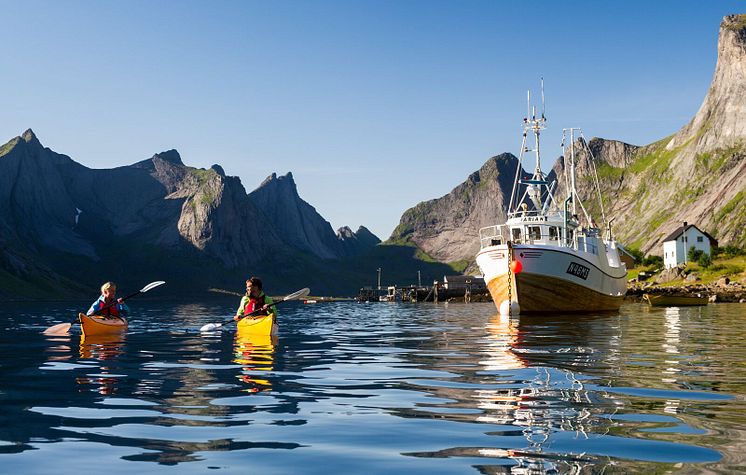 Kayaking in Reinefjorden. Reine in the Lofoten islands-Photo - CH  - VisitNorway.com.jpg