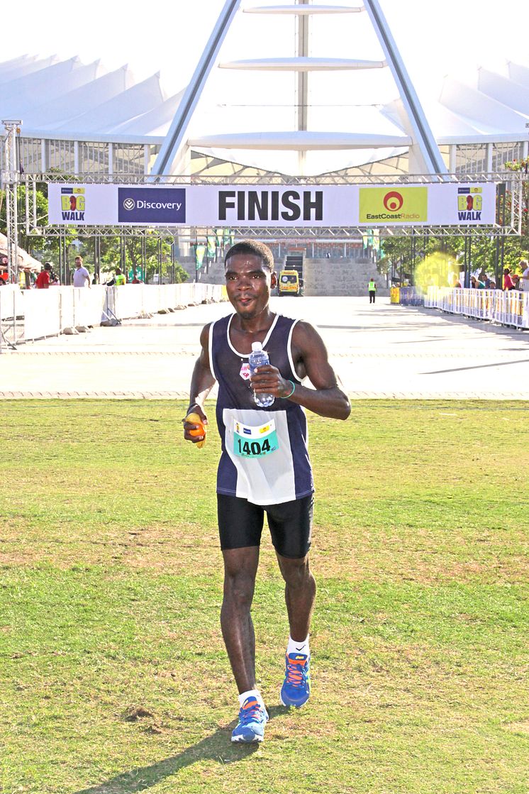 Discovery East Coast Radio Big Walk participant crosses the finish line 