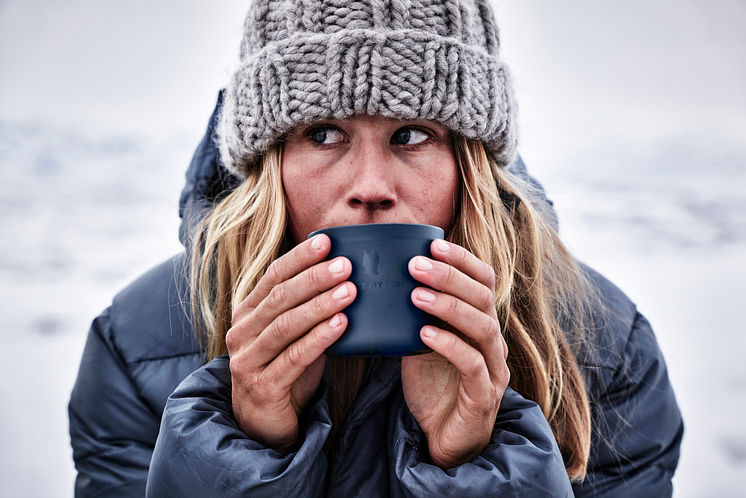 Close-up of woman drinking from cup