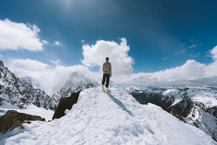 person-standing-on-slope-glacier-mountain-1081111