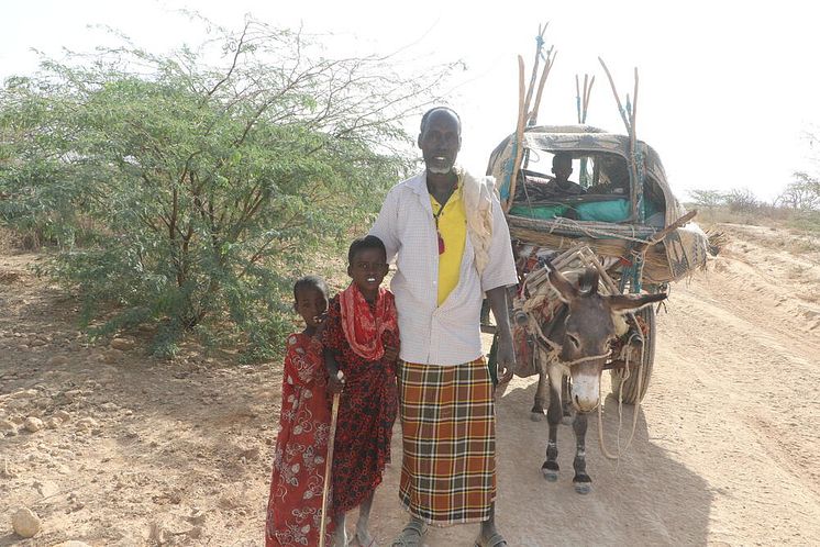  Ahmed*, 40, standing beside his 8-year-old son, Jember*, and 6-year-old daughter, Ayana*