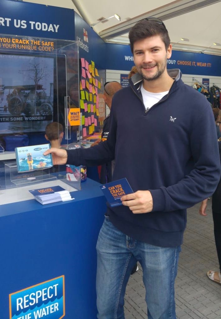 Hi-res image - Ocean Signal - James Bubb from Thatcham won the award-winning Ocean Signal rescueME MOB1 in the RNLI’s ‘Crack the Code Safe’ giveaway at Southampton Boat Show