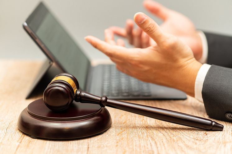 Hammer, laptop, hands - Mr. M Nobody_Shutterstock_1870174705.jpg