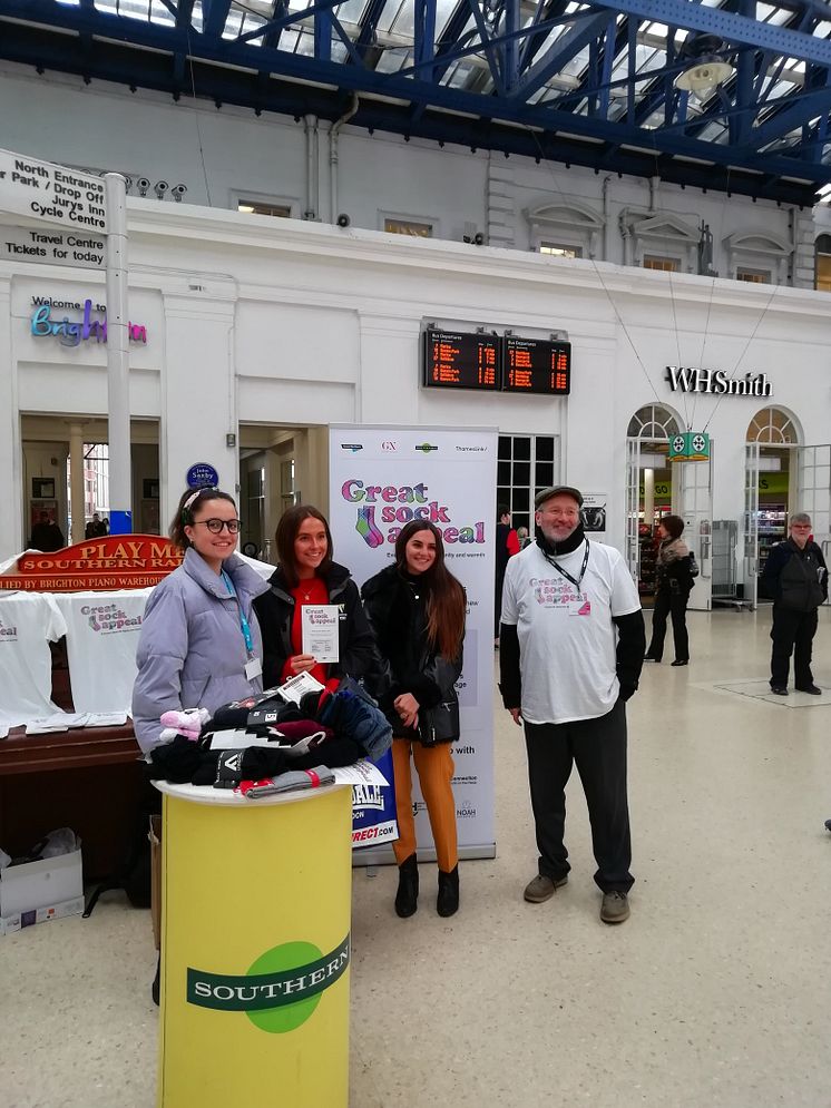 Volunteers last year collecting sock donations at Brighton station